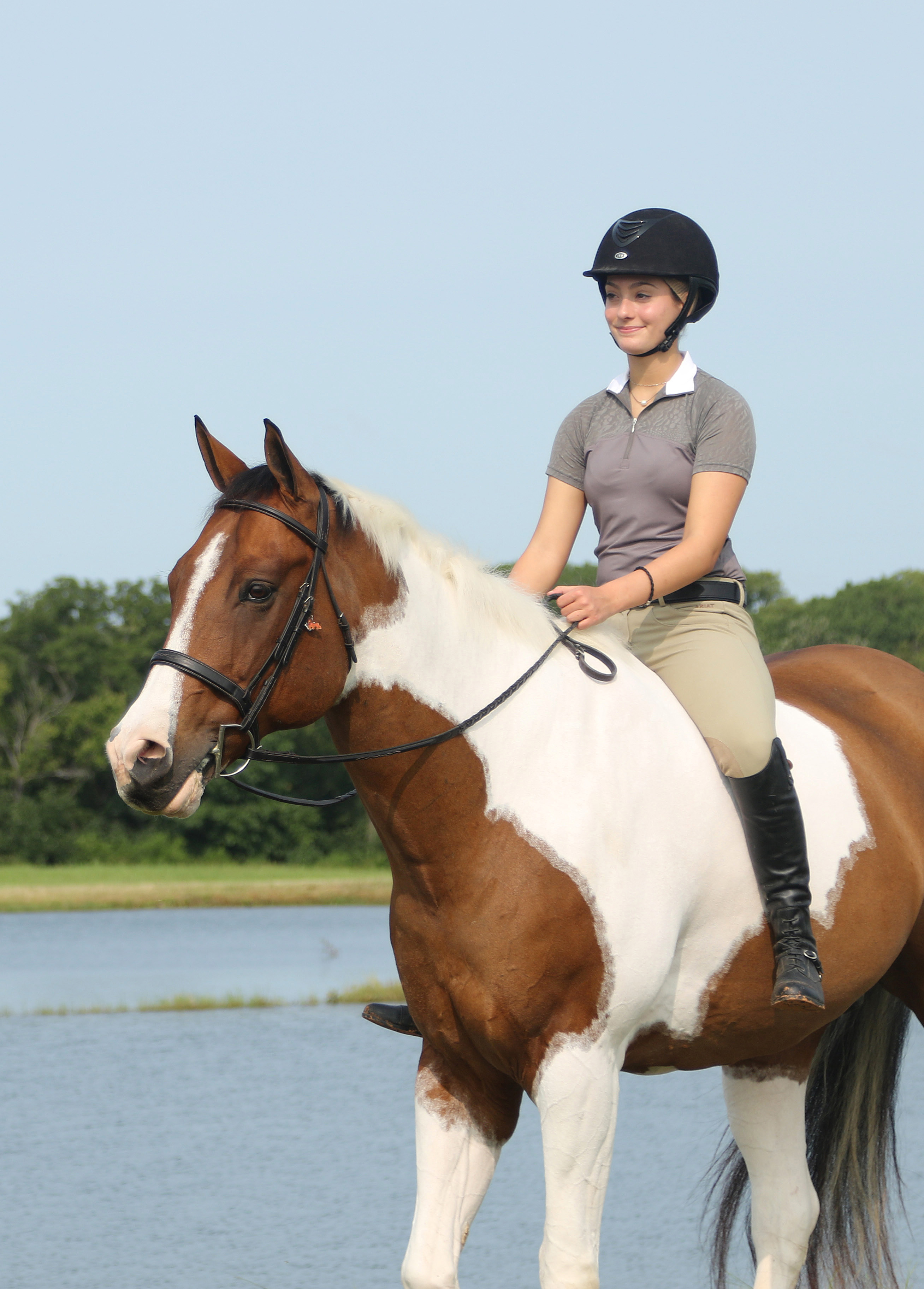 Photo of Ella riding Simba